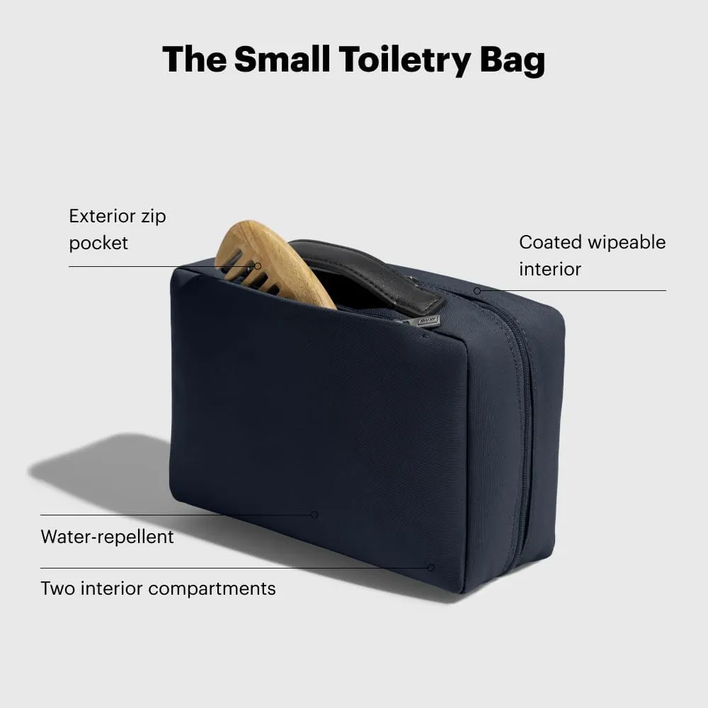 Away Small Toiletry Bag, Travel Essentials Organizer with Mesh and Clear Pockets, Waterproof, Easy to Clean, Compact Travel Pouch, Navy Blue