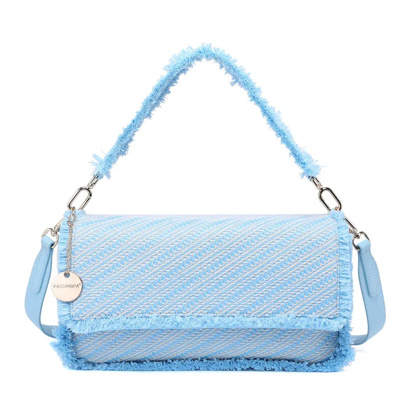 Diagonal woven flap shoulder bag with faux fur trim and charm detail wholesale